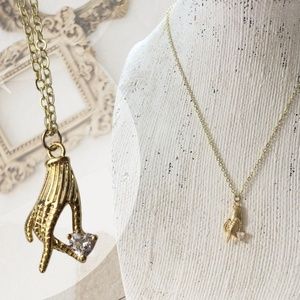 Hand with Cubic Zirconia Heart Necklace